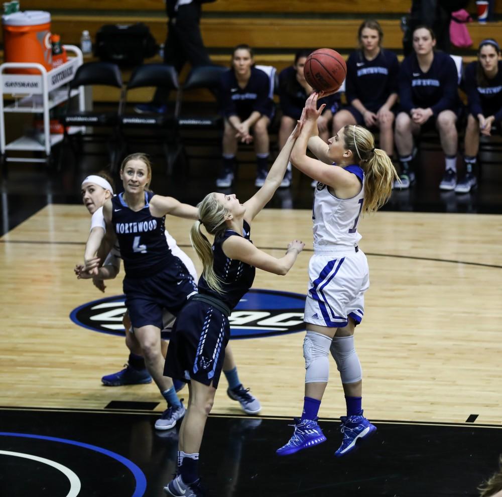 Taylor Lutz (10) elevates for a jump shot during the game vs. Northwood inside the Fieldhouse Arena in Allendale on Thursday, Feb. 9, 2017. 