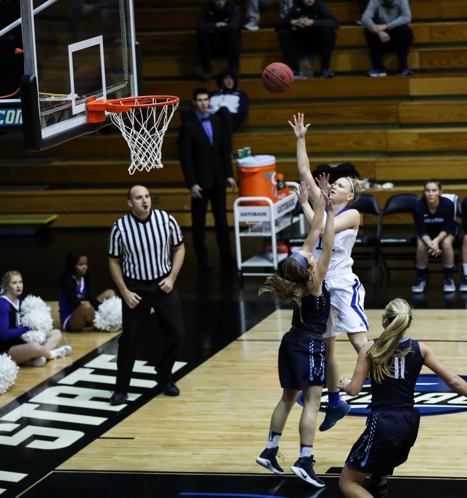 Piper Tucker (11) throws up a long floater during the game vs. Northwood inside the Fieldhouse Arena in Allendale on Thursday, Feb. 9, 2017. 