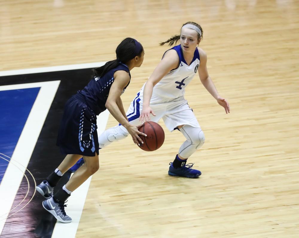 Jenn DeBoer (4) pursues a Northwood point guard during the game vs. Northwood inside the Fieldhouse Arena in Allendale on Thursday, Feb. 9, 2017. 