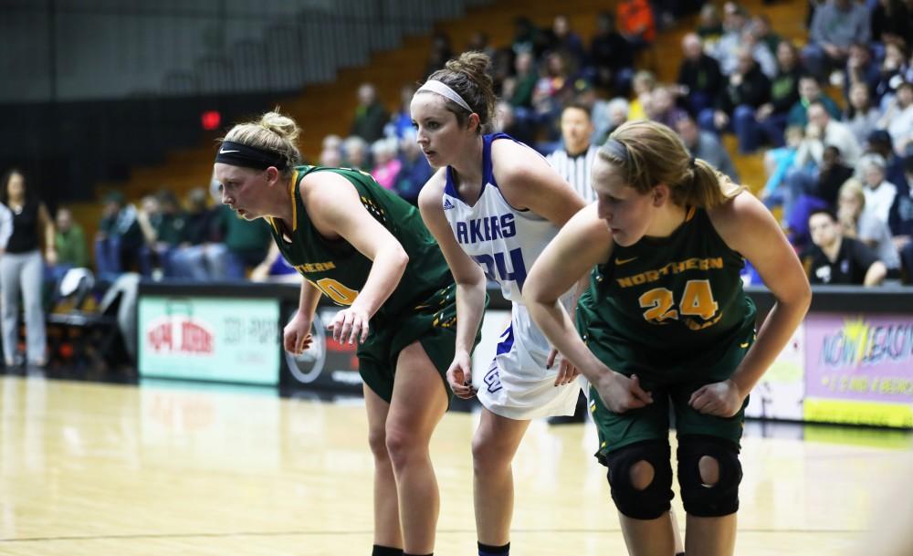 GVL/Kevin Sielaff - Bailey Cairnduff (34) prepares to box out after a free throw attempt during the game against Northern Michigan on Saturday, Feb. 18, 2017 inside the Fieldhouse Arena in Allendale.