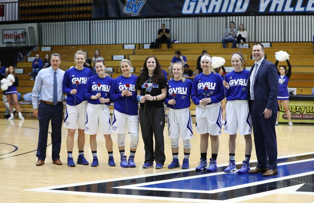GVL/Kevin Sielaff - Seniors from the womens basketball team are celebrated before the game against Northern Michigan on Saturday, Feb. 18, 2017 inside the Fieldhouse Arena in Allendale.