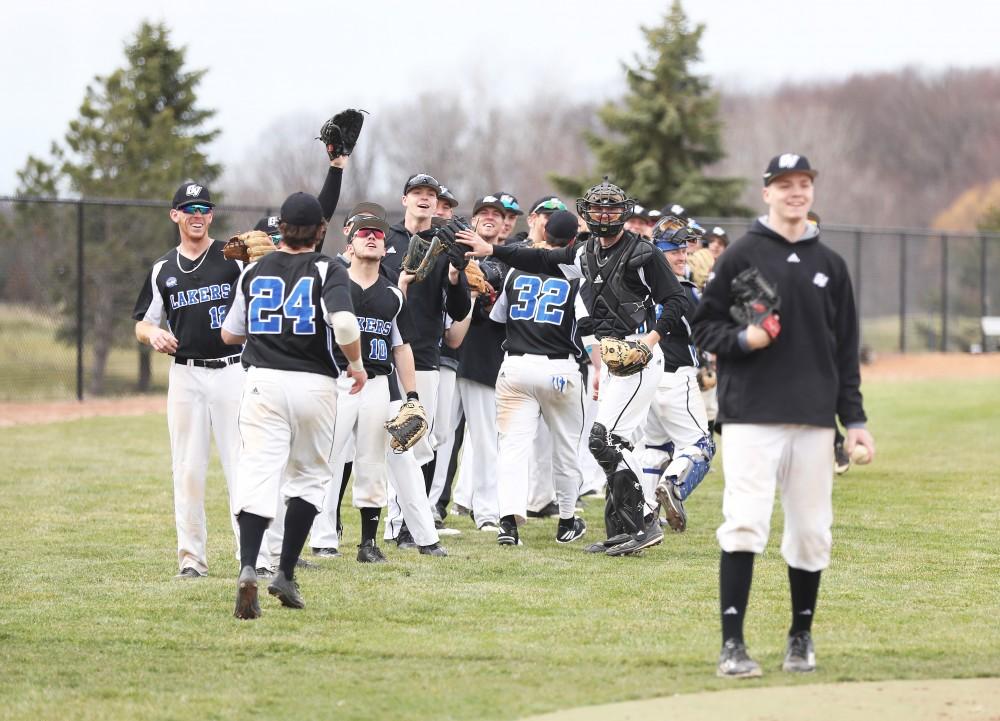 GVL/Kevin Sielaff - The baseball team warms up before the game vs. Lewis University on Wednesday, March 29, 2017. 