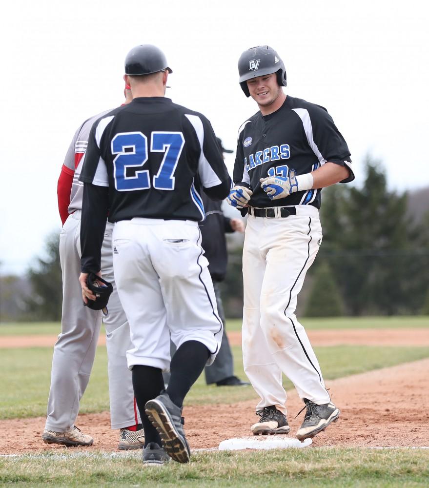 GVL/Kevin Sielaff - Anthony Villar (17) celebrates a base hit during the game vs. Lewis University on Wednesday, March 29, 2017. 