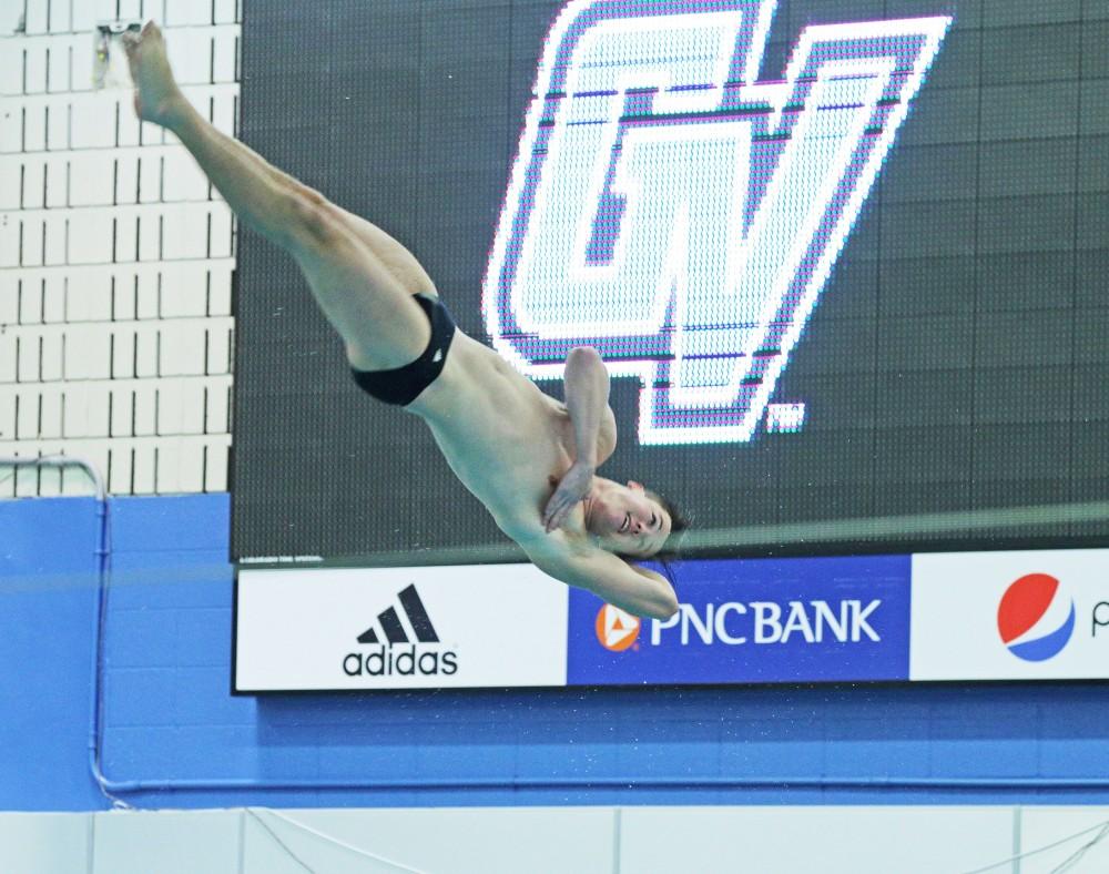 GVL/Emily Frye - Brad Dalrymple dives on Saturday, Jan. 28, 2017.