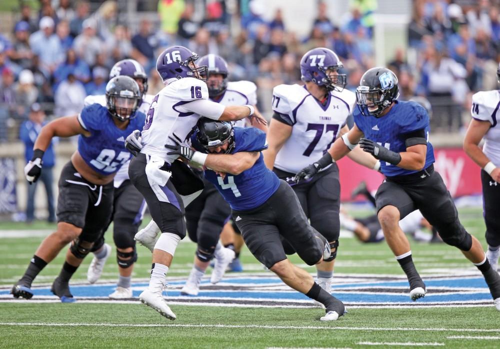 GVL / Emily Frye - Alton Voss sacks the Truman State quarterback on Saturday Oct. 15, 2016.