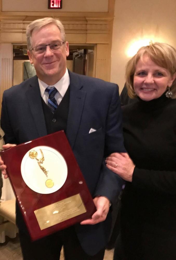GVL / Courtesy - WGVUJay Lowe, pictured with his wife Colleen Lowe, receives the Silver Circle Award in Birmingham, Mich. on Sunday, Feb. 26, 2017. 