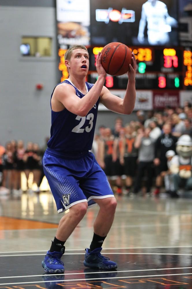 GVL/Kevin Sielaff - Luke Ryskamp (23) pulls up for a free throw during the game versus Findlay at the University of Findlay on Tuesday, Feb. 28, 2017.