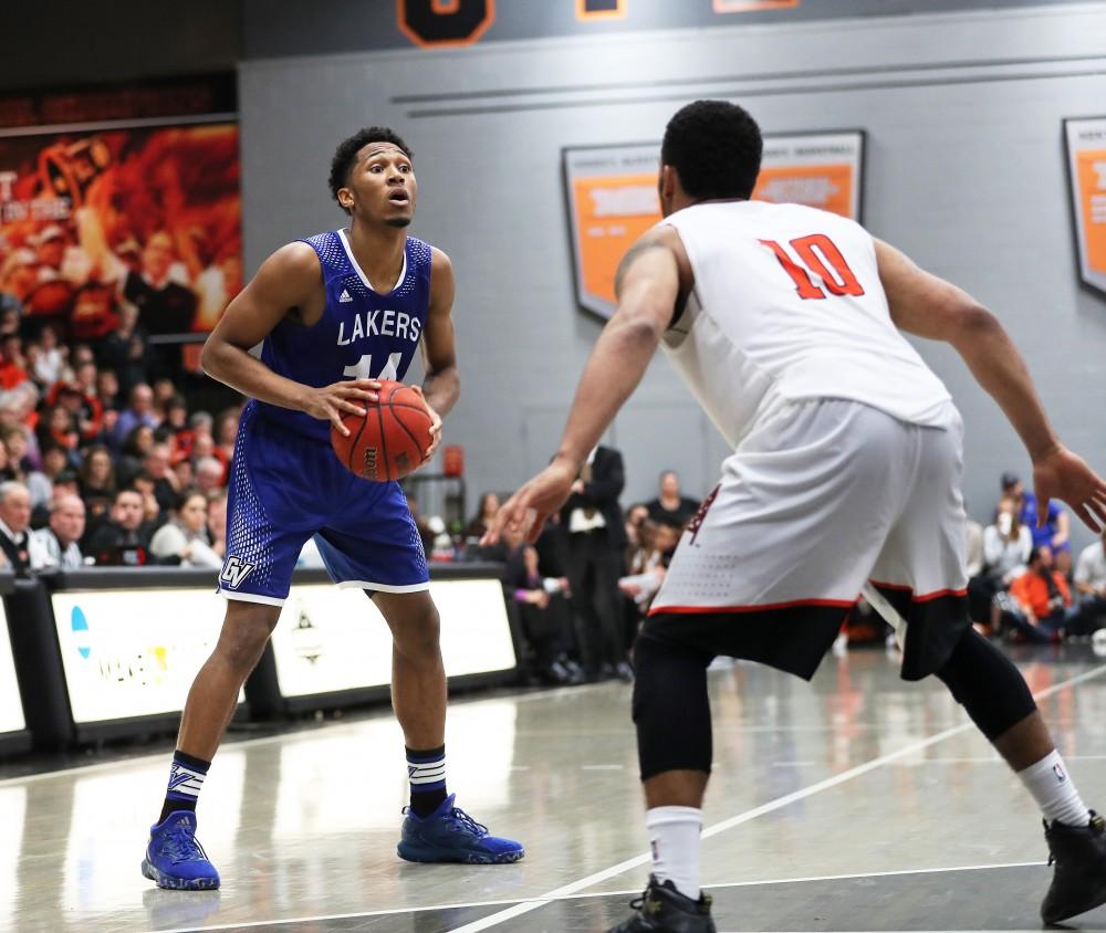 GVL/Kevin Sielaff - Chris Dorsey (14) picks up his dribble and looks to pass during the game versus Findlay at the University of Findlay on Tuesday, Feb. 28, 2017.