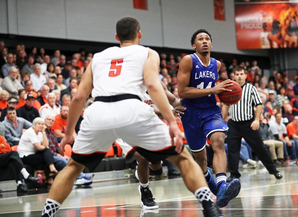 GVL/Kevin Sielaff - Chris Dorsey (14) goes up for a lay up during the game versus Findlay at the University of Findlay on Tuesday, Feb. 28, 2017.