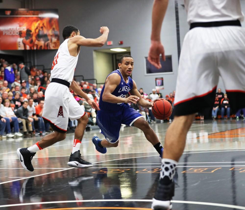 GVL/Kevin Sielaff - Myles Miller (12) moves into the paint during the game versus Findlay at the University of Findlay on Tuesday, Feb. 28, 2017.