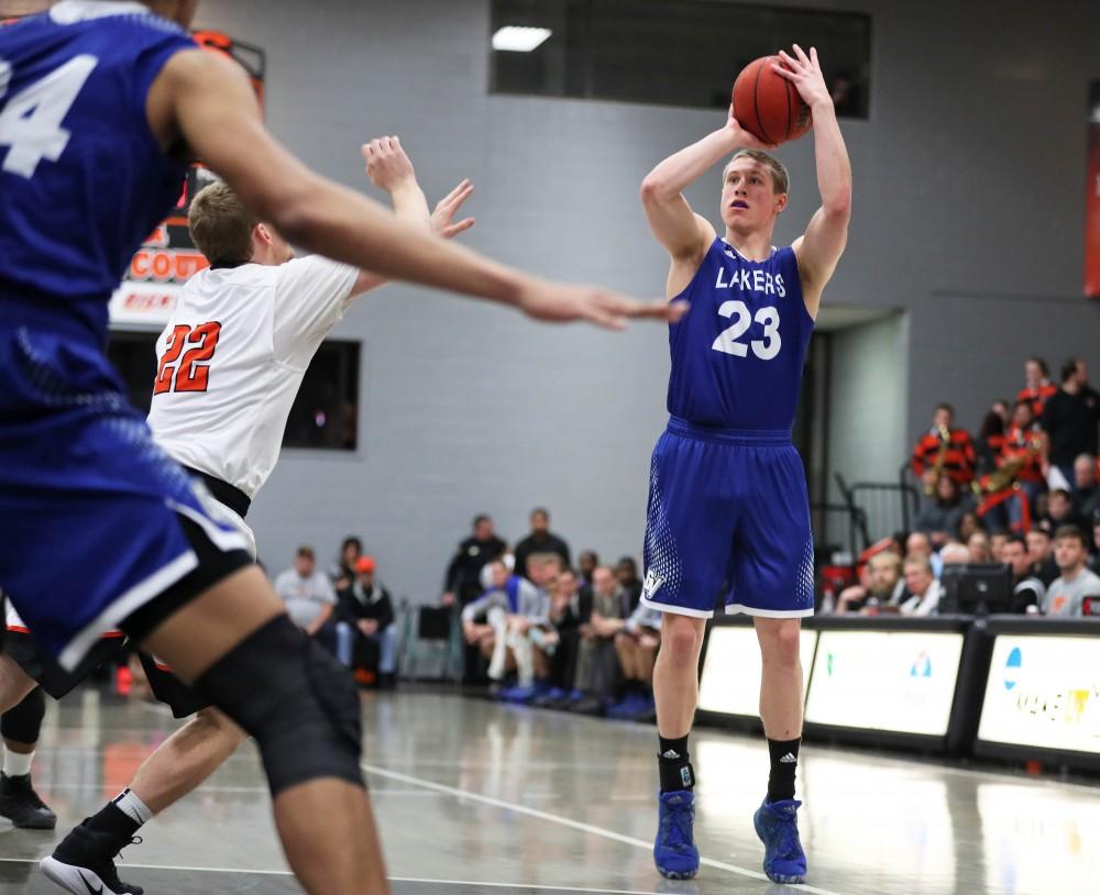 GVL/Kevin Sielaff - Luke Ryskamp (23) pulls up for a shot during the game versus Findlay at the University of Findlay on Tuesday, Feb. 28, 2017.