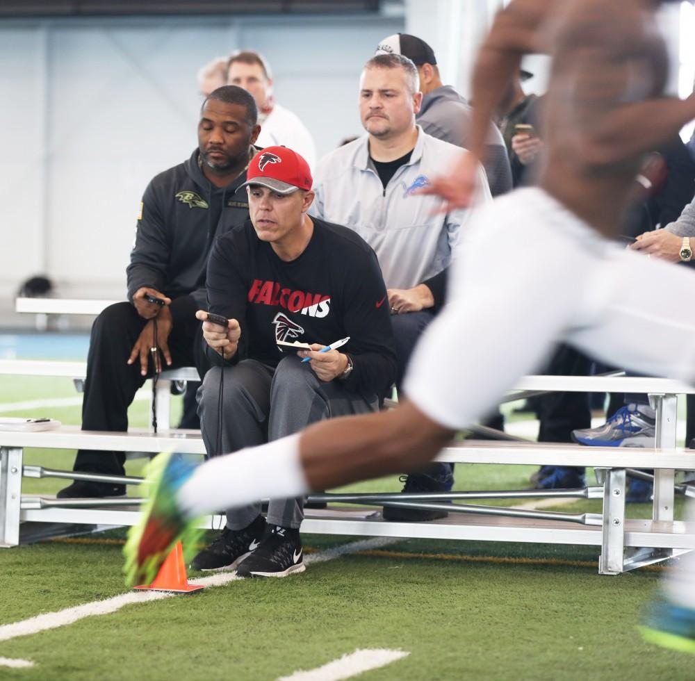 GVL/Kevin Sielaff - Scouts time athletes during Pro Day inside the Kelly Family Sports Center on Monday, Mar. 20, 2017.