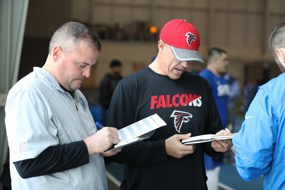 GVL/Kevin Sielaff - NFL scouts review stats during Pro Day inside the Kelly Family Sports Center on Monday, Mar. 20, 2017.