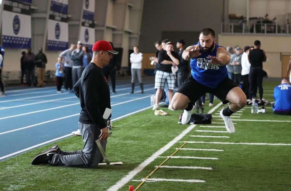 GVL/Kevin Sielaff - Alton Voss participates in the broad jump during Pro Day inside the Kelly Family Sports Center on Monday, Mar. 20, 2017.