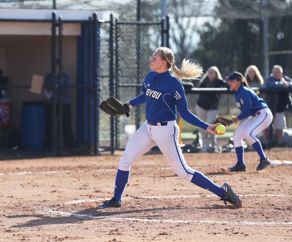 GVL/Kevin Sielaff - Ellie Balbach (11) throws a pitch during the game vs. Lewis on Tuesday, March 28, 2017.