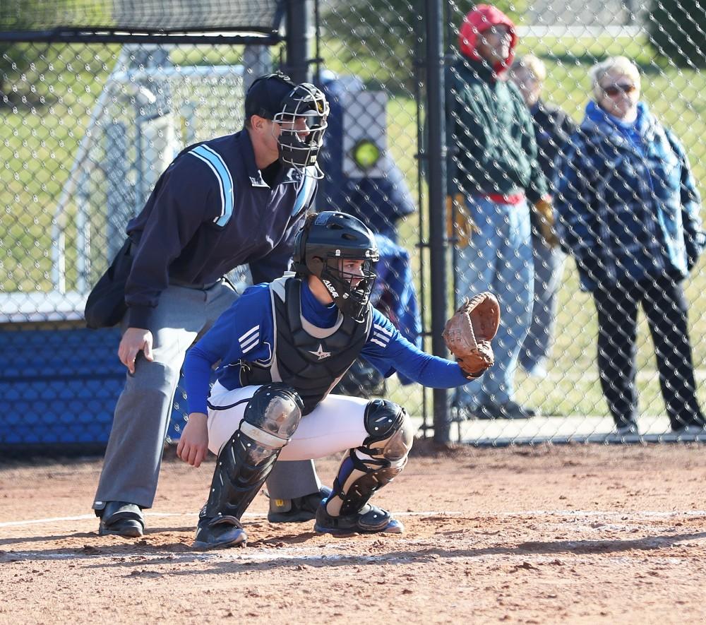 GVL/Kevin Sielaff - Jessica Ramos (16) prepares to pull in a pitch during the game vs. Lewis on Tuesday, March 28, 2017.