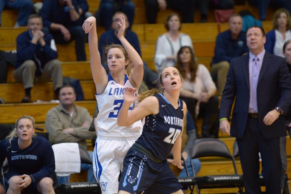 GVL / Luke Holmes - Bailey Cairnduff (34) shoots the three. GVSU Women’s Basketball defeated Northwood in the Fieldhouse Arena on Tuesday, Feb. 28, 2016.