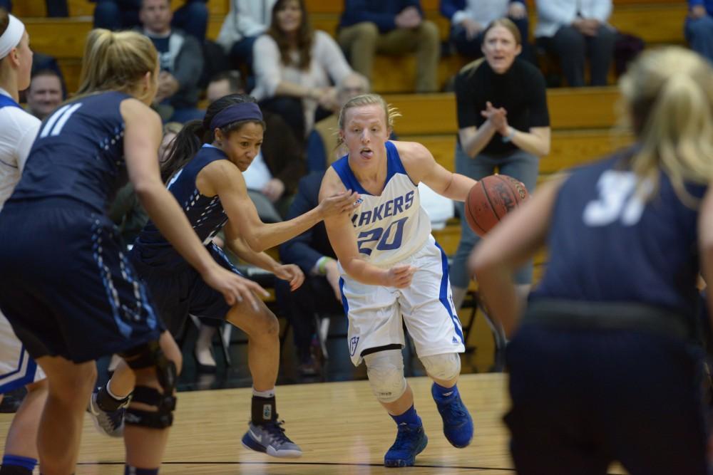 GVL / Luke Holmes - Janae Langs (20) drives to the hole. GVSU Women’s Basketball defeated Northwood in the Fieldhouse Arena on Tuesday, Feb. 28, 2016.