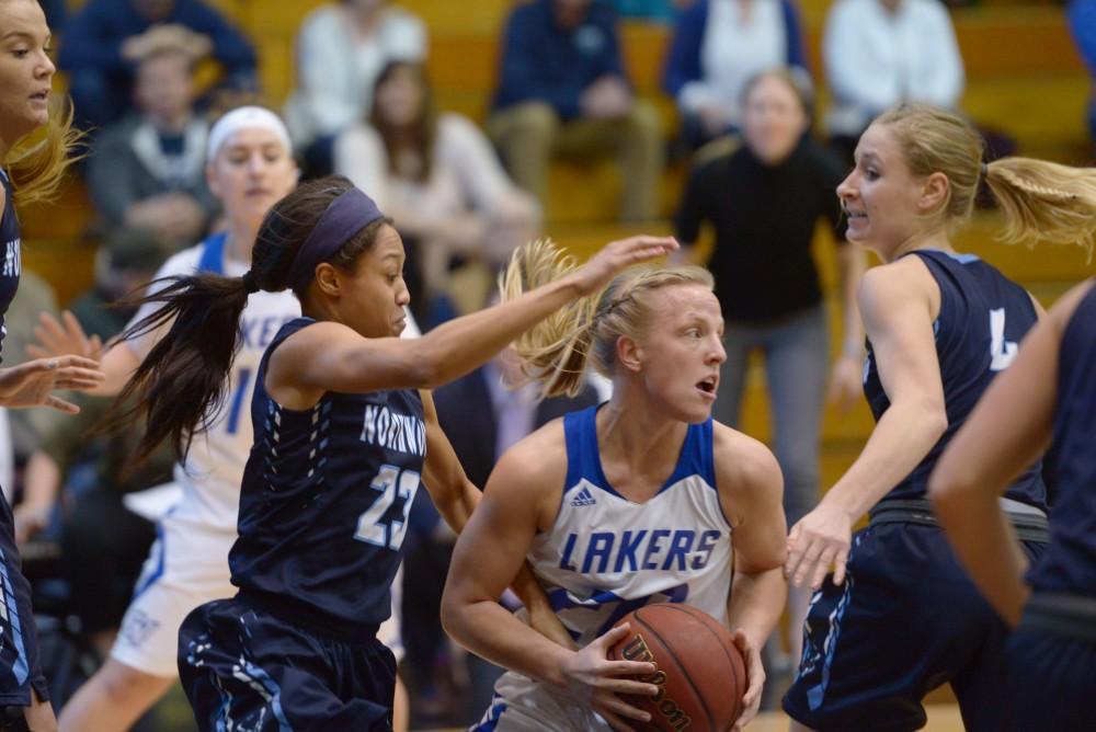 GVL / Luke Holmes - Janae Langs (20) protects the ball. GVSU Women’s Basketball defeated Northwood in the Fieldhouse Arena on Tuesday, Feb. 28, 2016.