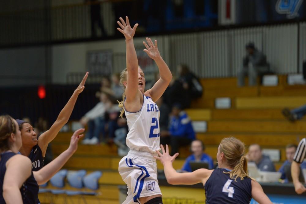 GVL / Luke Holmes - Janae Langs (20) gets the shot off in time for the buzzer. GVSU Women’s Basketball defeated Northwood in the Fieldhouse Arena on Tuesday, Feb. 28, 2016.