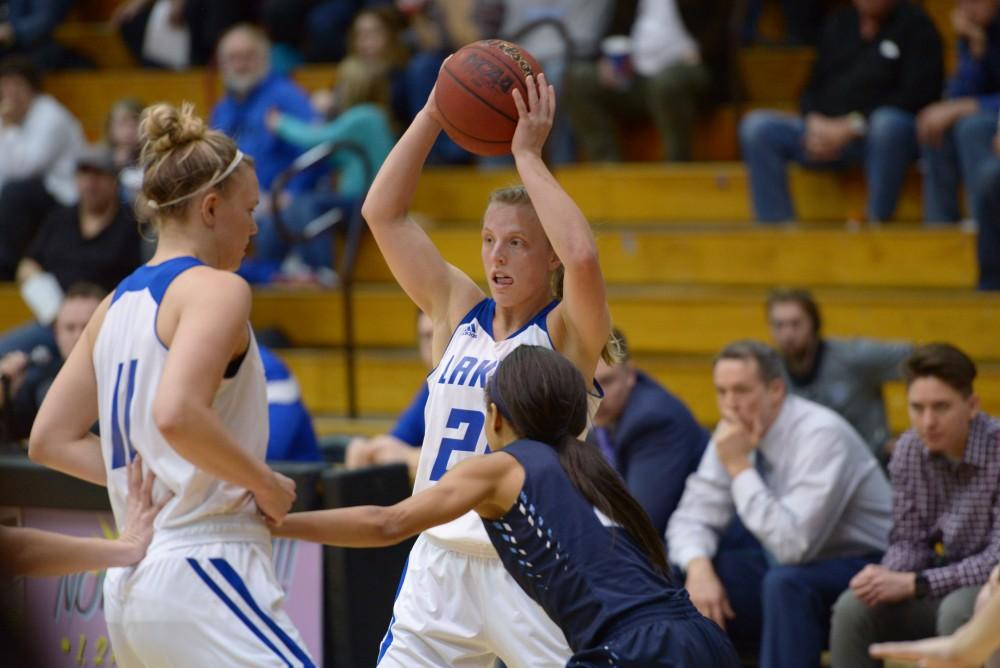 GVL / Luke Holmes - Janae Langs (20) tries to get rid of the ball. GVSU Women’s Basketball defeated Northwood in the Fieldhouse Arena on Tuesday, Feb. 28, 2016.