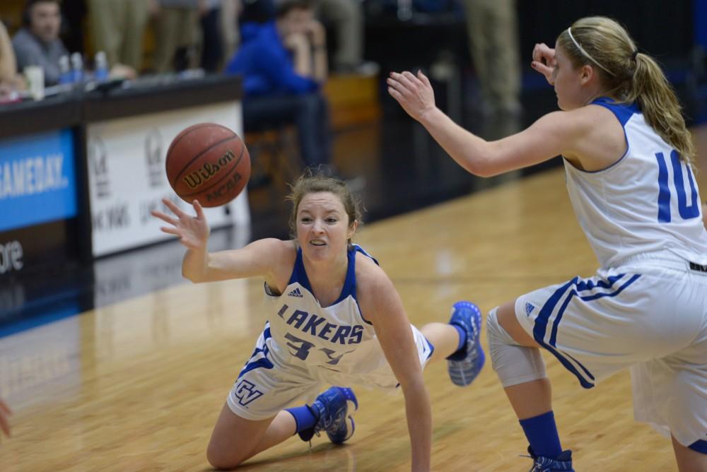 GVL / Luke Holmes - Bailey Cairnduff (34) dives for the ball. GVSU Women’s Basketball defeated Northwood in the Fieldhouse Arena on Tuesday, Feb. 28, 2016.