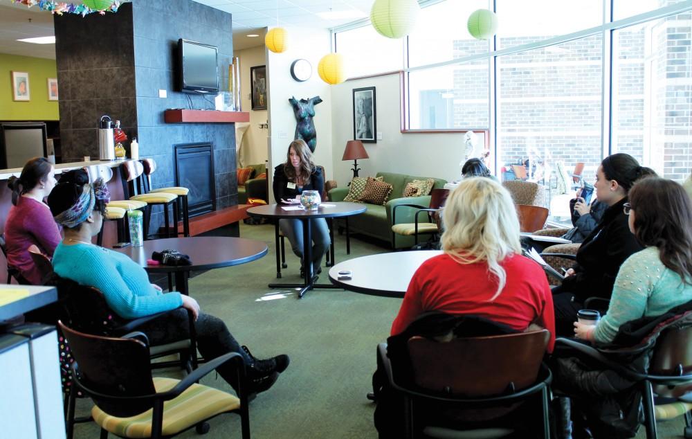 GVL / Emily Frye - Former Assistant Director of the Women's Center, Brittany Dernberger, leads a discussion on sexual assualt inside of Women's Center on Tuesday, Jan. 27, 2015. 