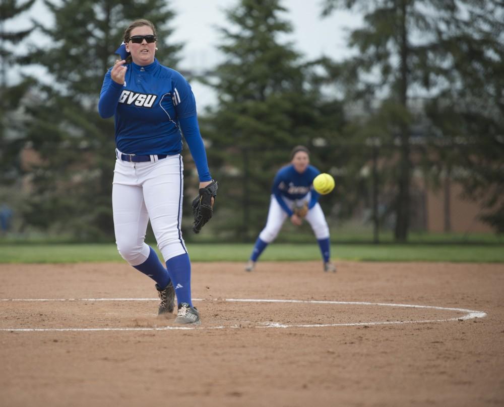 GVL / Luke Holmes - Allison Lipovsky (18) throws the pitch. Grand Valley Womens Softball won 9-5 in their first game against Lake Superior State on Monday, April 18, 2016.