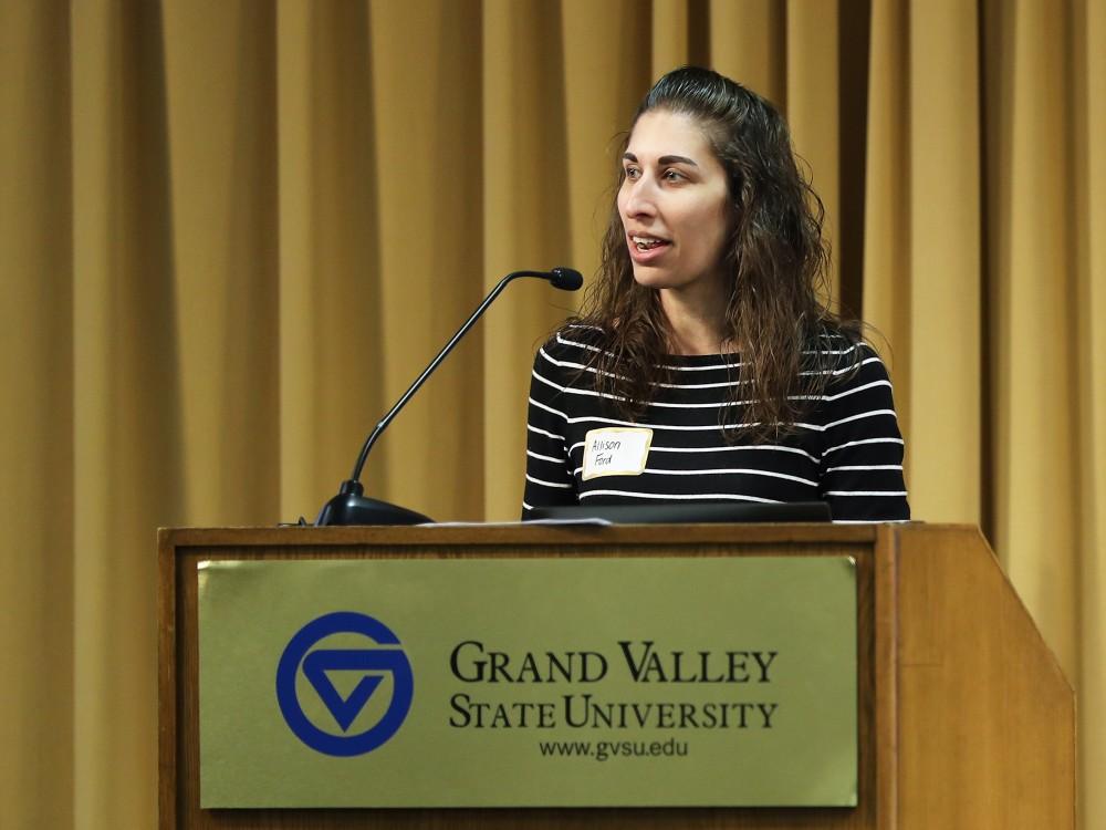 GVL/Kevin Sielaff - Allison Ford, head coach of GVSU's synchronized skating team receives the Community Impact Award during the Women's Commission Awards inside the Kirkhof Center on Thursday, March 30, 2017.