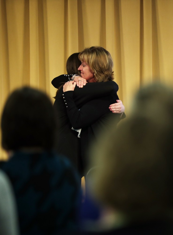 GVL/Kevin Sielaff - Sue Sloop, the coordinator of mediation services for faculty and staff, receives a special recognition at the ceremony during the Women's Commission Awards inside the Kirkhof Center on Thursday, March 30, 2017.