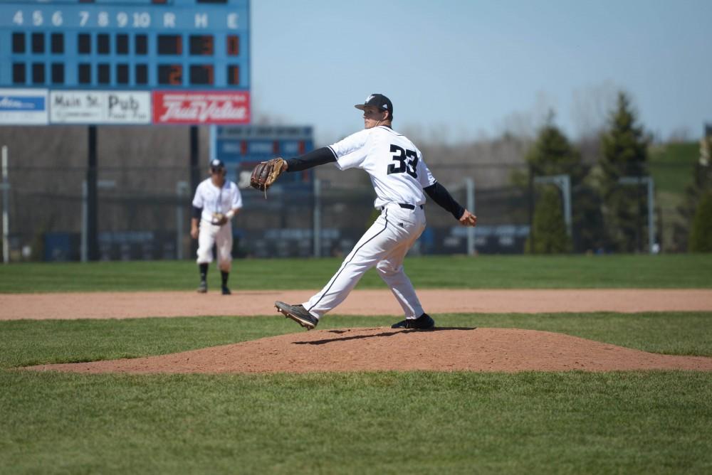 GVL / Luke Holmes -  Jake Mason (33) throws the pitch. GVSU Men's Baseball faced off against Ohio Dominican in a double header on Saturday, April 8, 2017.