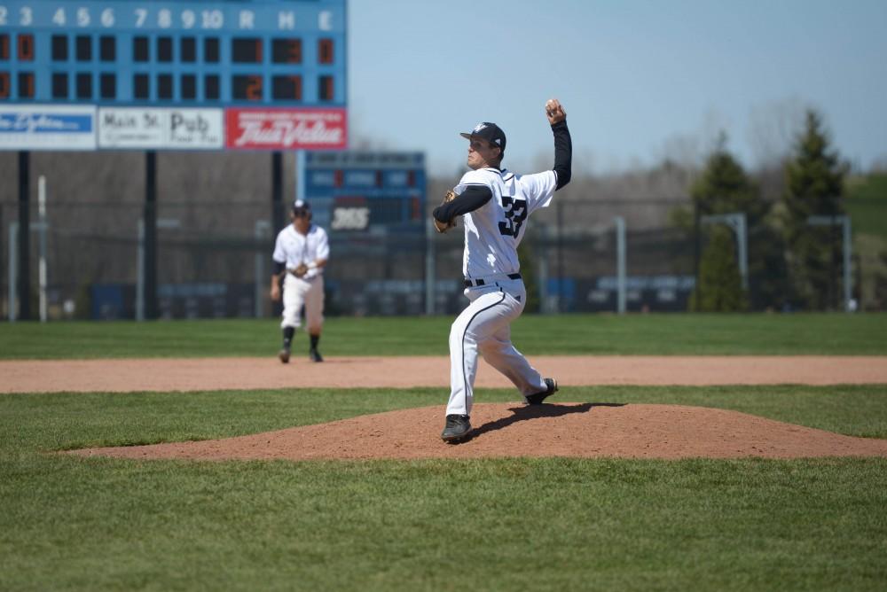 GVL / Luke Holmes -  Jake Mason (33) throws the pitch. GVSU Men's Baseball faced off against Ohio Dominican in a double header on Saturday, April 8, 2017.