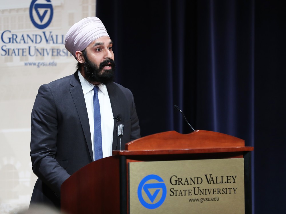 GVL/Kevin Sielaff - Dr. Simran Jeet Singh speaks to the crowd gathered at Loosemore Auditorium in downtown Grand Rapids on Thursday, March 30, 2017.