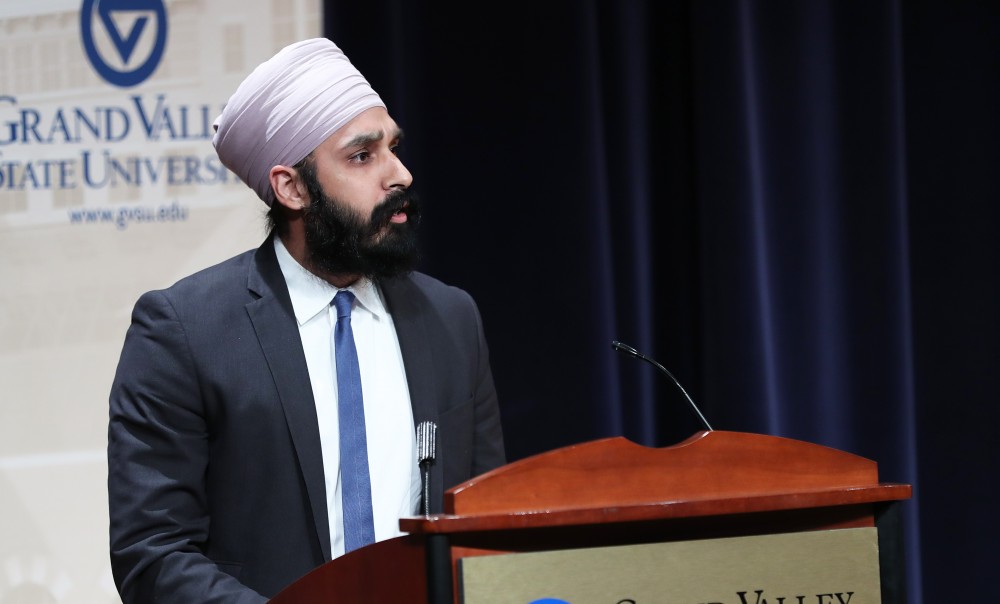 GVL/Kevin Sielaff - Dr. Simran Jeet Singh speaks to the crowd gathered at Loosemore Auditorium in downtown Grand Rapids on Thursday, March 30, 2017.