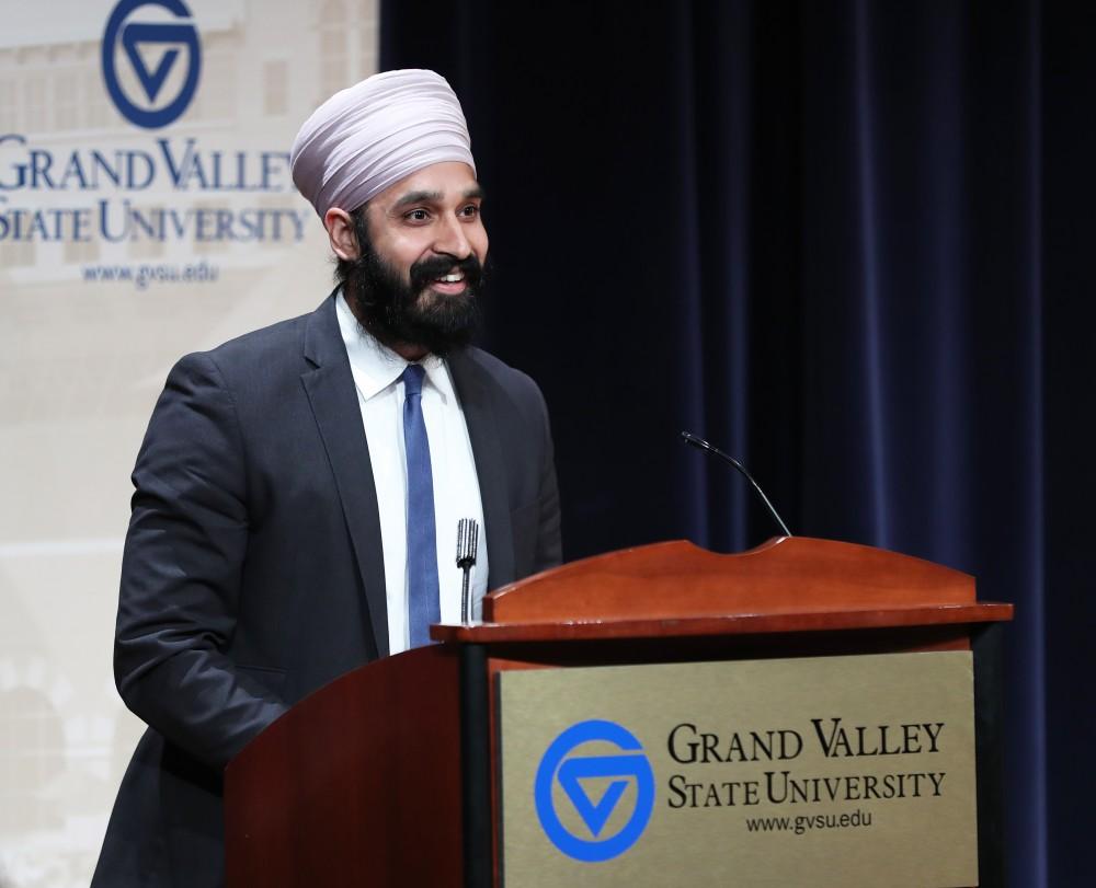 GVL/Kevin Sielaff - Dr. Simran Jeet Singh speaks to the crowd gathered at Loosemore Auditorium in downtown Grand Rapids on Thursday, March 30, 2017.