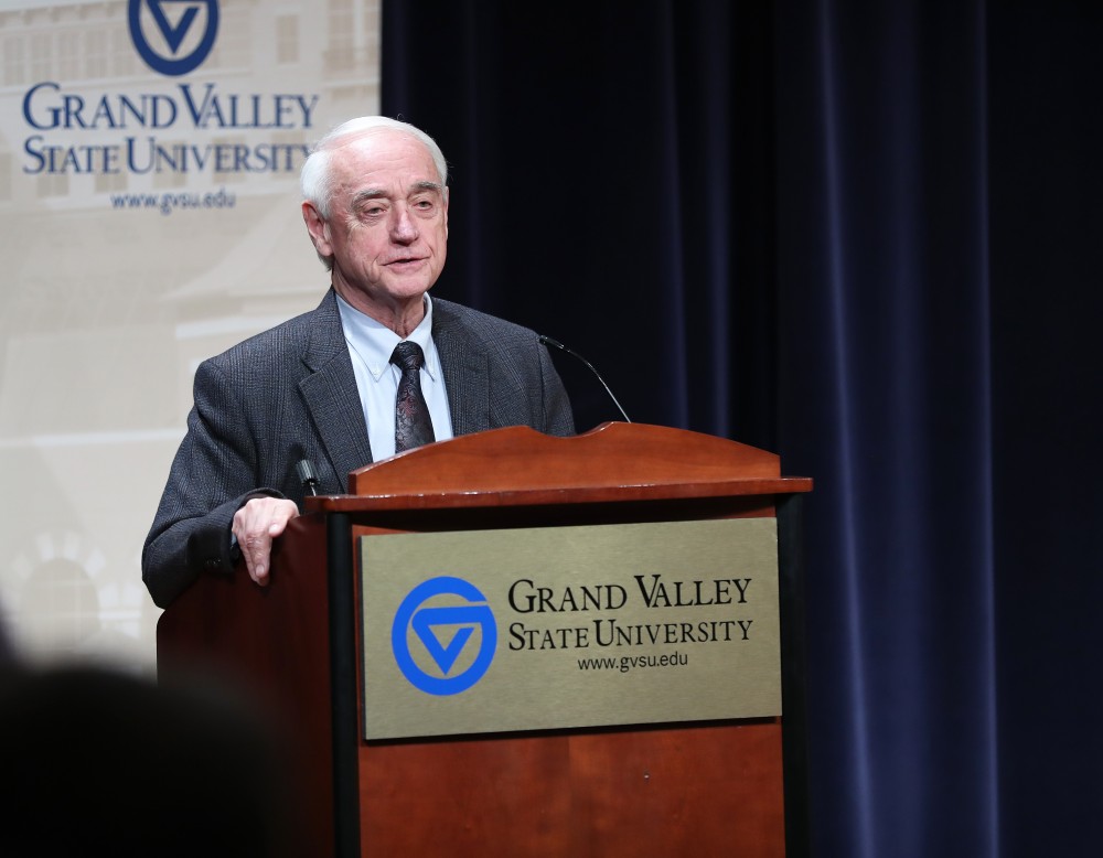 GVL/Kevin Sielaff - Douglas Kindschi introduces Dr. Simran Jeet Singh to the crowd gathered at Loosemore Auditorium in downtown Grand Rapids on Thursday, March 30, 2017.