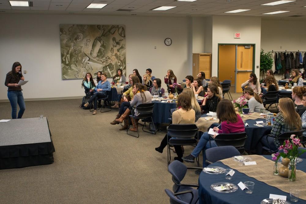 GVL/Luke Holmes - Clare Holmes (left) starts the meeting by explaining what the Raw Beauty Initiative is all about; the Raw Beauty Initiative student organization holds a meeting in Kirkhof on Thursday, Oct. 15, 2015. 