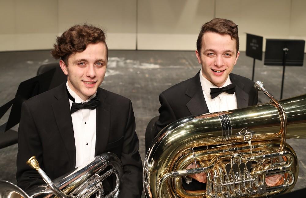GVL/Kevin Sielaff - Nikolaus (left) and Lukas (right) Schroeder pose for a photo on the stage of the Louis Armstrong Auditorium on Friday, April 14, 2017. 