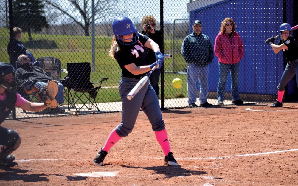 GVL/Hannah Zajac - Brooke Little (17) takes a swing during the game on Saturday, April 8, 2017.