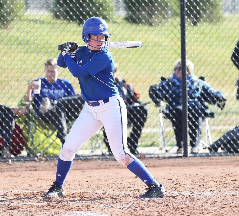 GVL/Kevin Sielaff - Jenna Lenza (4) prepares to take a swing during the game vs. Lewis on Tuesday, March 28, 2017.