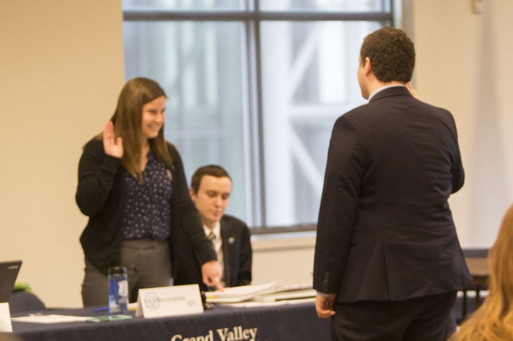 GVL/Mackenzie Bush - Jonathan Bowman takes the oath after being elected President of Student Senate for the 2017-2018 school year Thursday, April 14, 2017. 