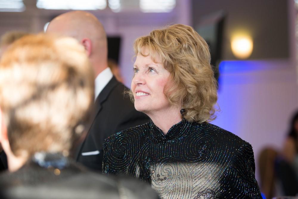 GVL / Luke Holmes -  Marcia Haas talks to some of the attendees. The Student Veterans gala was held in the Alumni House on Saturday, April 8, 2017.