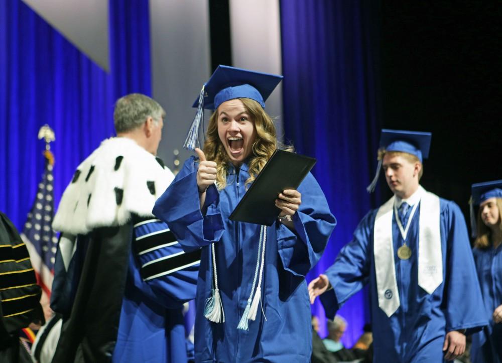 GVL / Emily FryeGrand Valley State Univeristy student celebrates receiving her diploma during graduation on Saturday April 29, 2017.