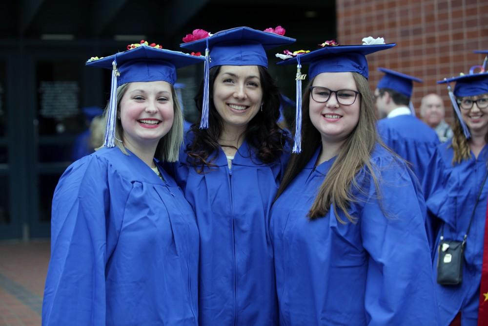 GVL / Emily FryeGrand Valley State Univeristy students Emily Paruszkiewicz, Lyndsie Hosang, and Kelsey New before graduation on Saturday April 29, 2017.