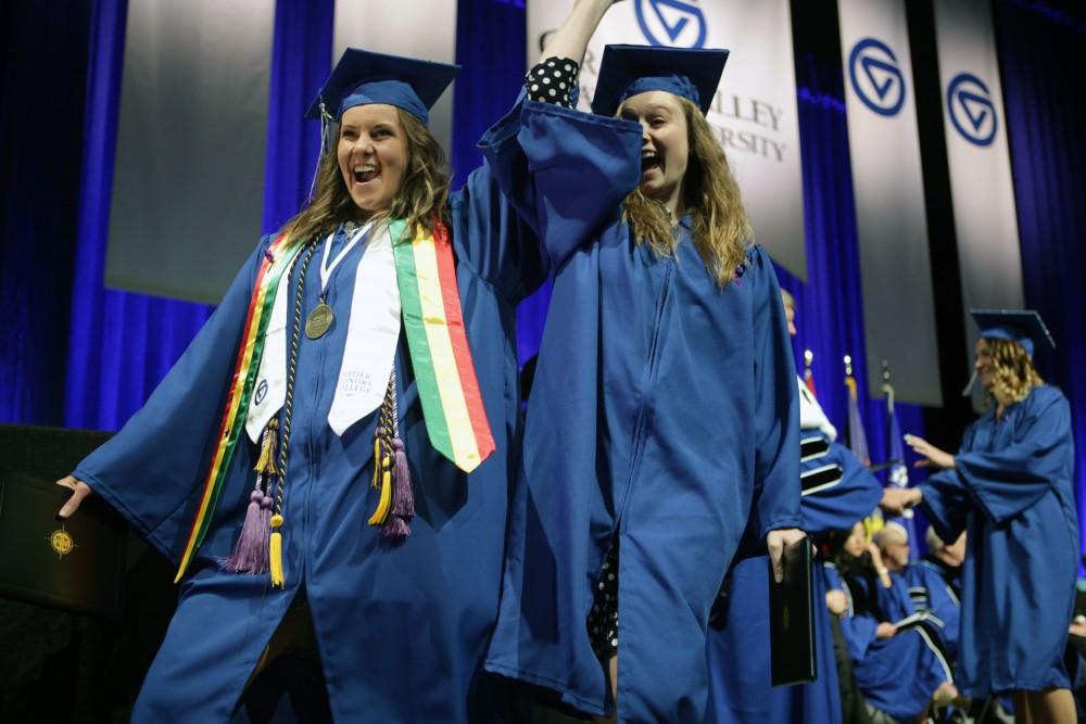 GVL / Emily FryeGrand Valley State Univeristy students celebrate receiving their diplomas during graduation on Saturday April 29, 2017.