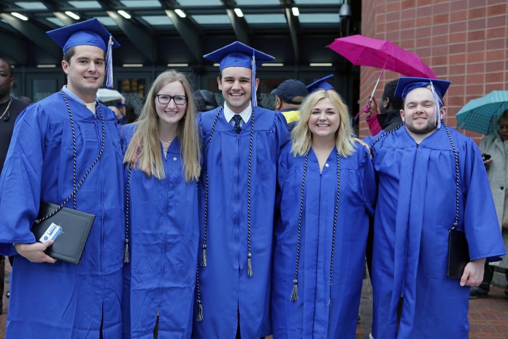 GVL / Emily Frye
The Grand Valley Lanthorn newspaper graduating staff after graduation on Saturday April 29, 2017.