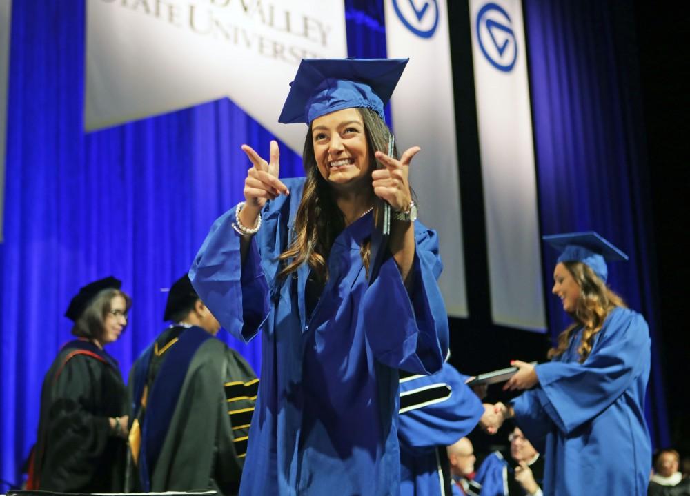 GVL / Emily FryeGrand Valley State Univeristy student Gabriella Barbiari celebrates receiving her diploma during graduation on Saturday April 29, 2017.