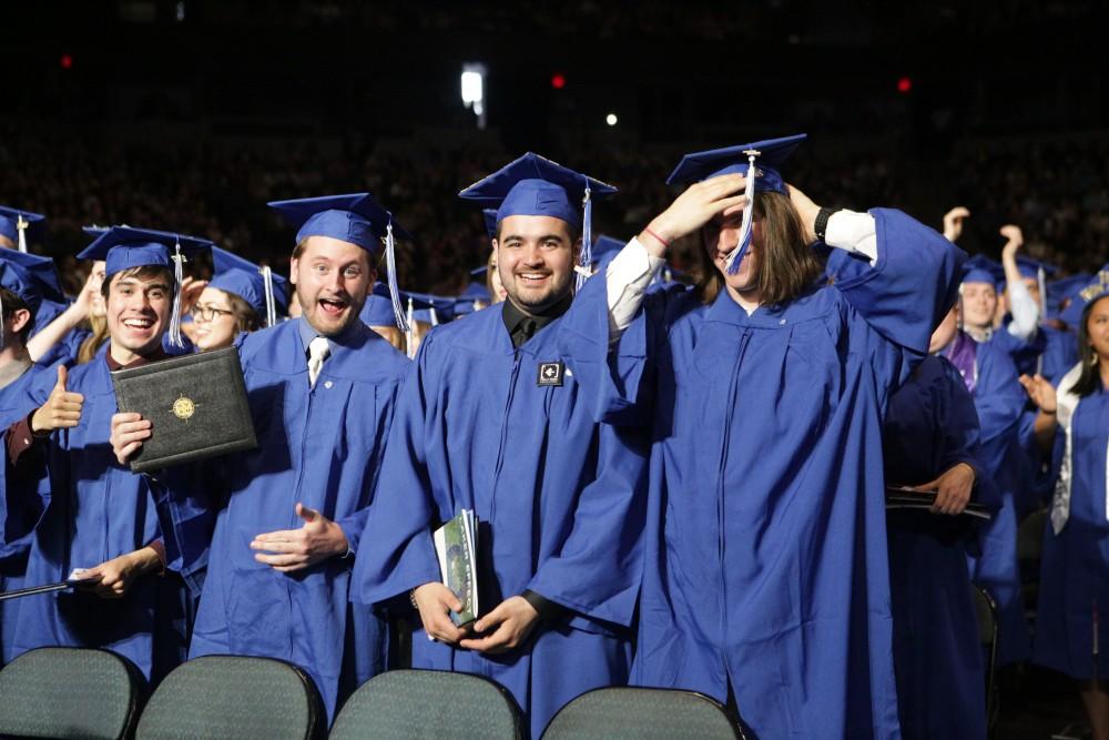 GVL / Emily FryeGrand Valley State Univeristy students celebrate receiving their diplomas during graduation on Saturday April 29, 2017.
