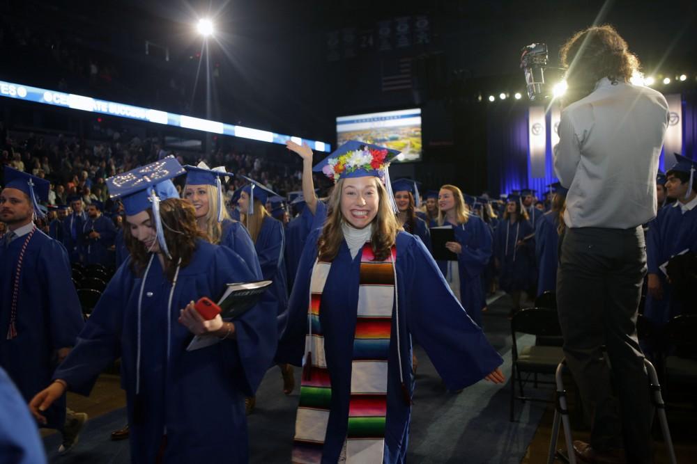 GVL / Emily FryeGrand Valley State University student celebrates during graduation on Saturday April 29, 2017.