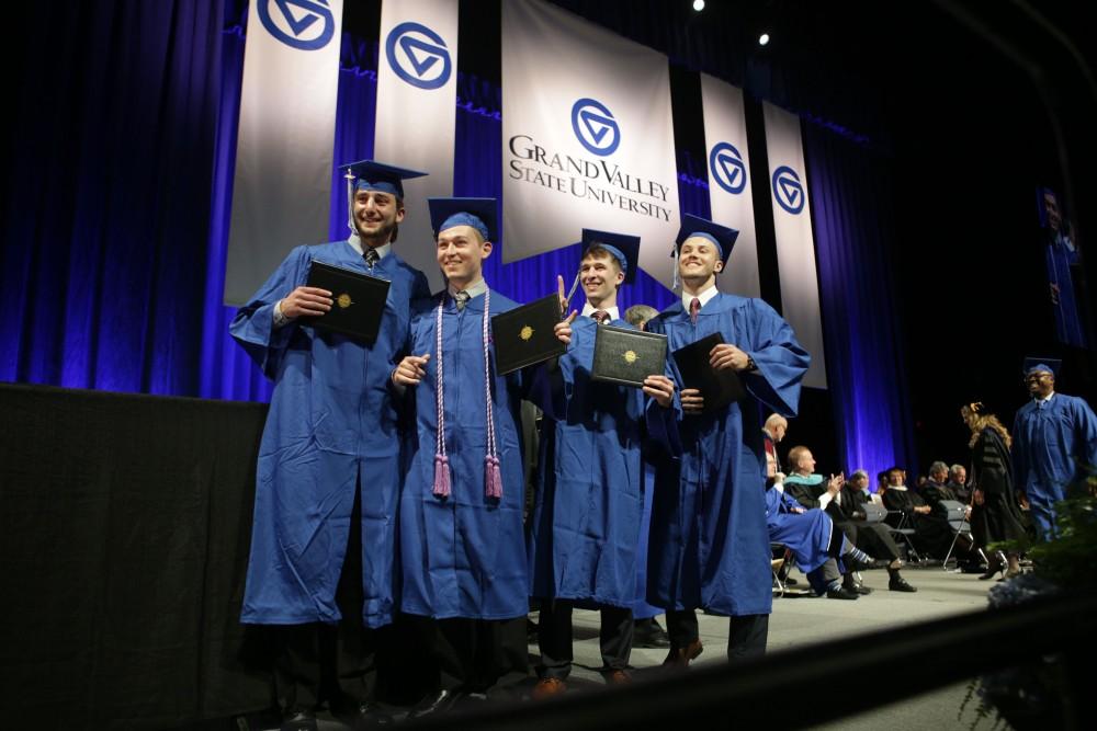 GVL / Emily FryeGrand Valley State University students celebrate receiving their diploma during graduation on Saturday April 29, 2017.
